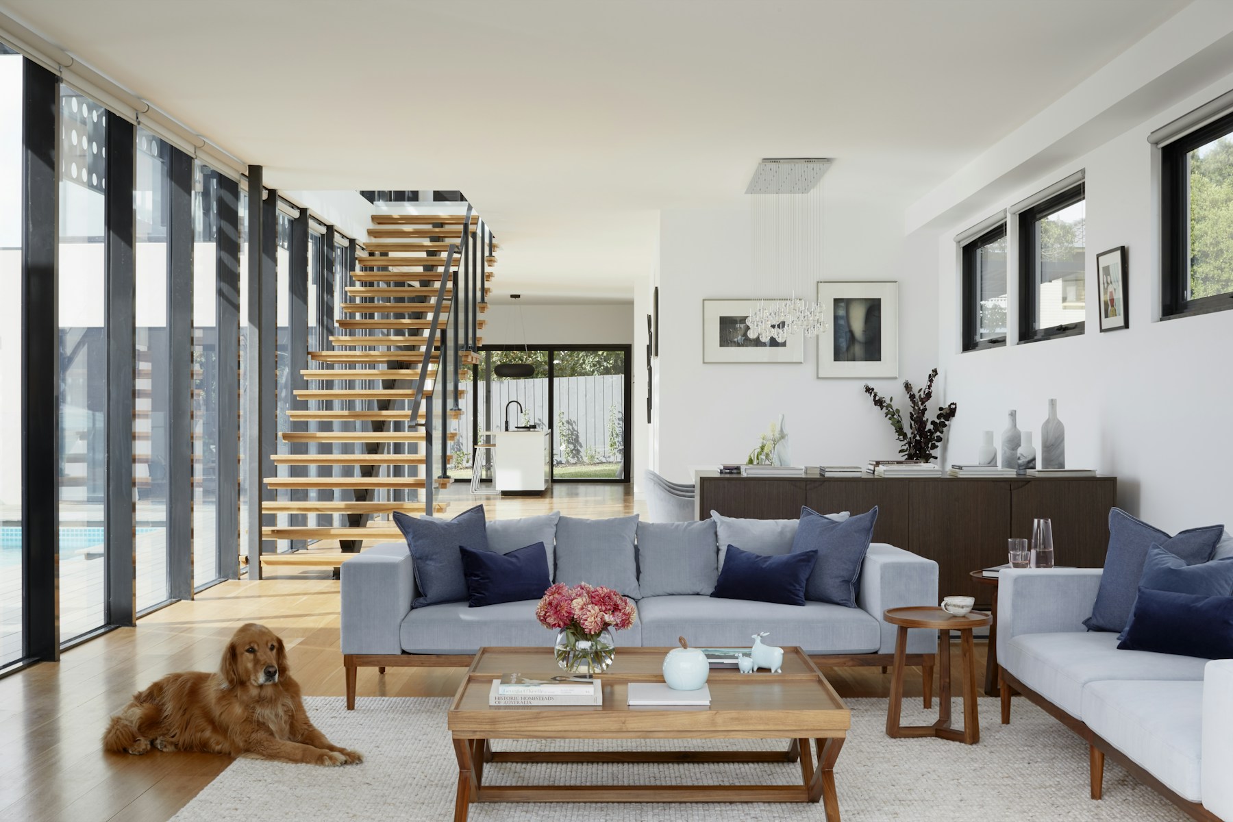 Bright coastal contemporary interior with professionally installed wallpaper